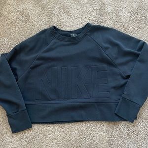 Black NIKE slightly cropped shirt